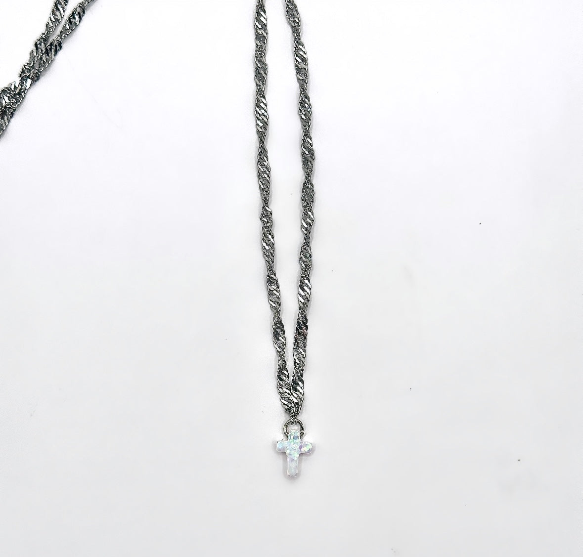 THE OPAL MICRO CROSS