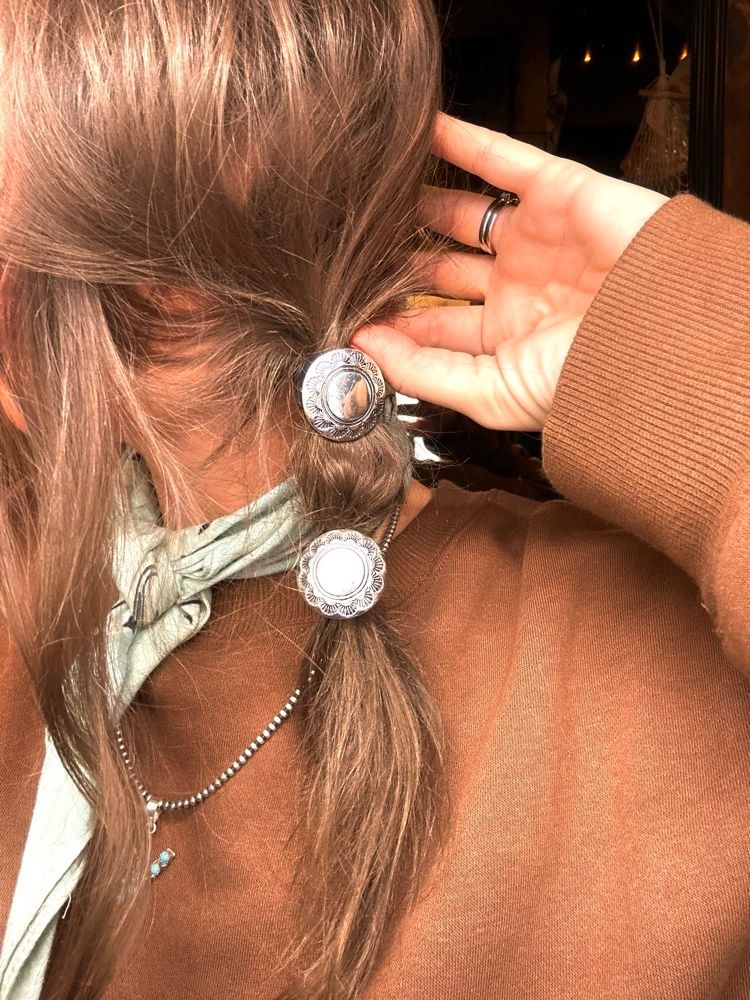 THE TWO BRAIDS