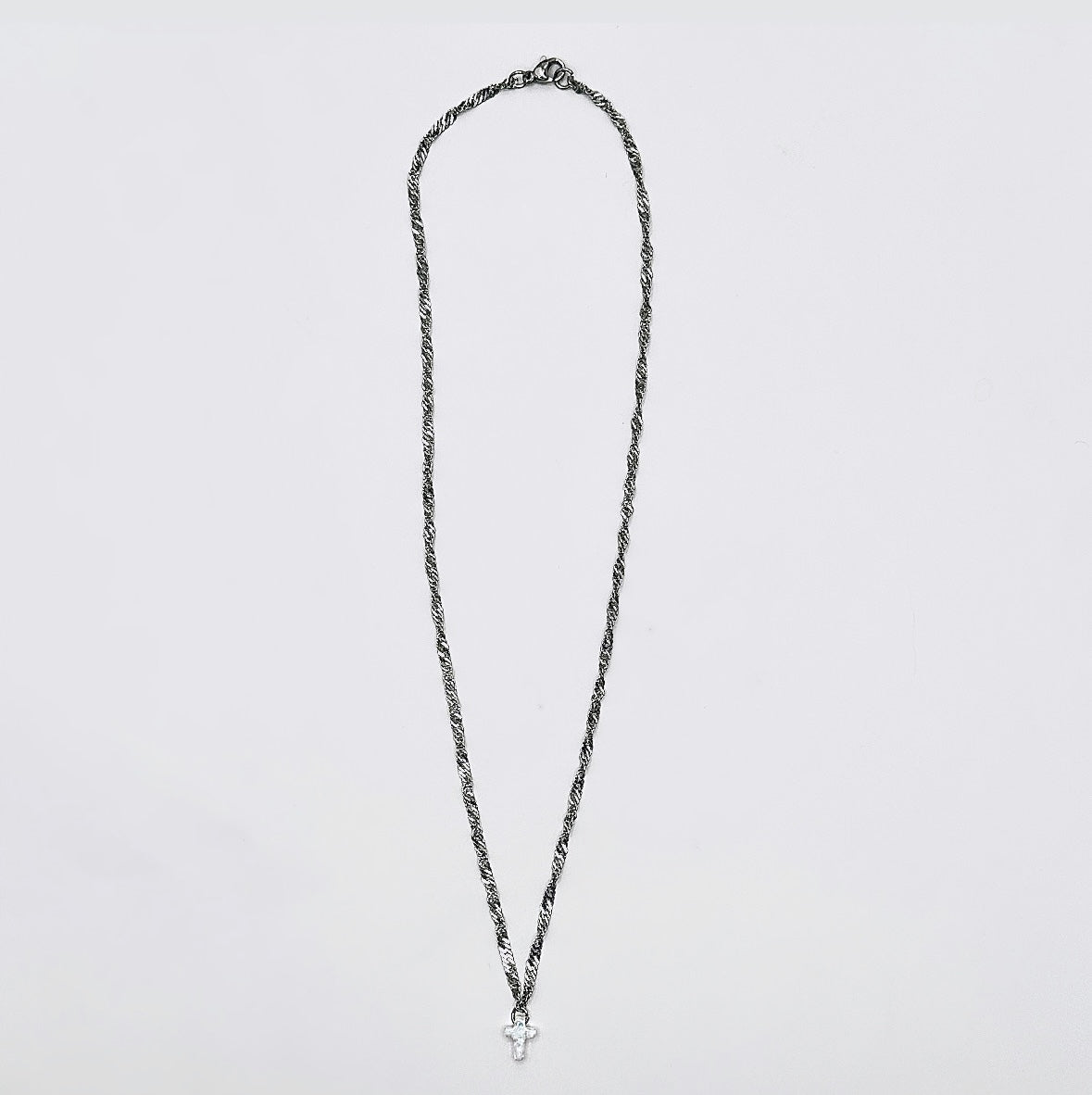 THE OPAL MICRO CROSS
