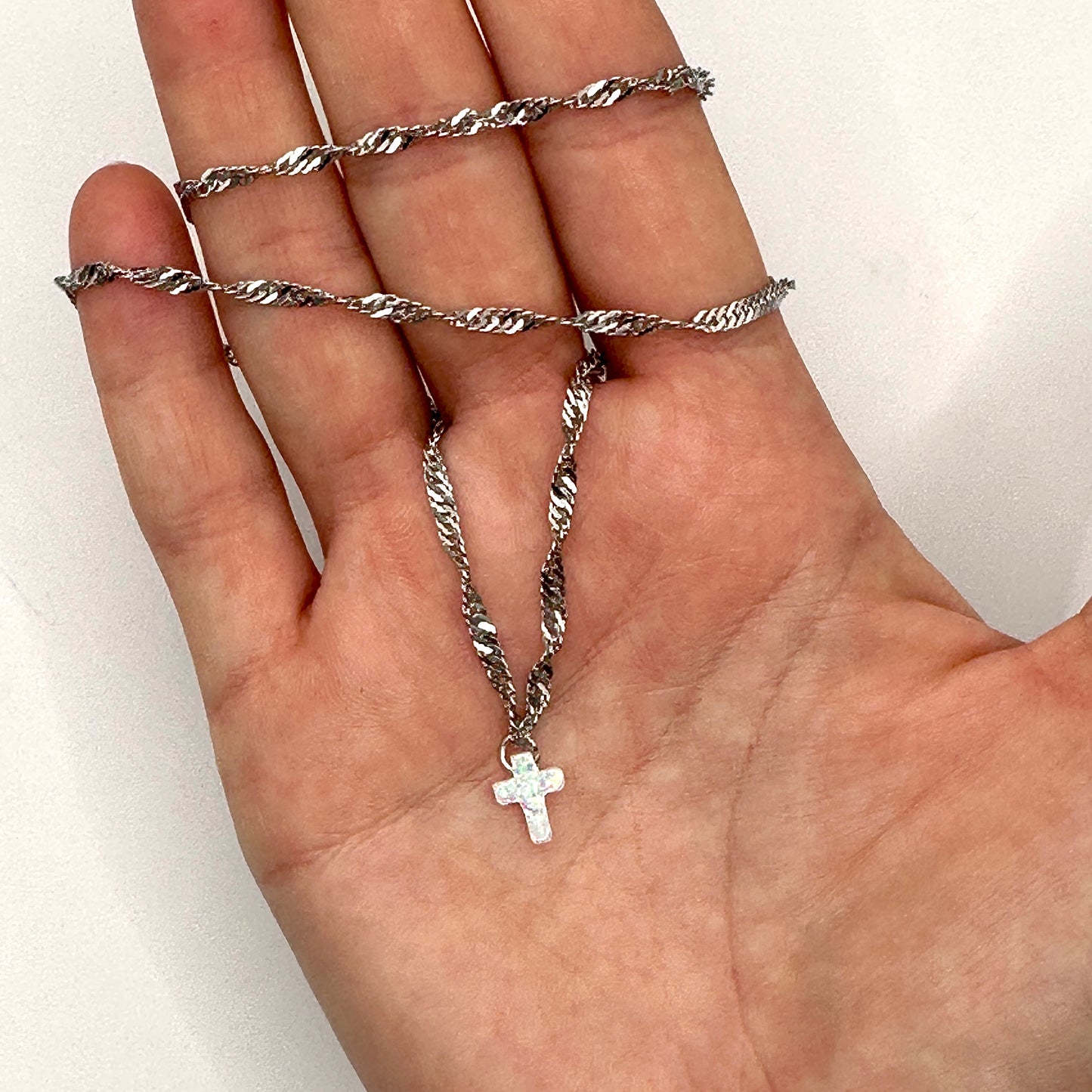THE OPAL MICRO CROSS